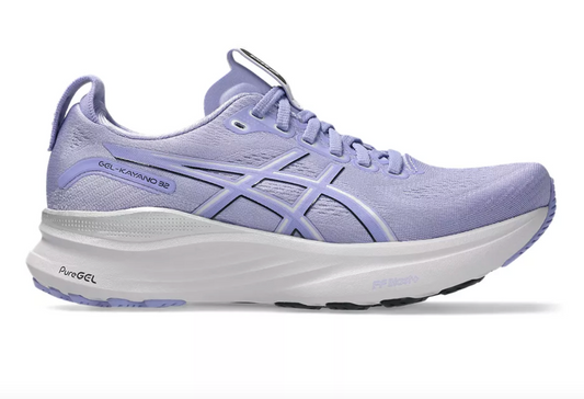 Purple running shoe with white sole on a white background